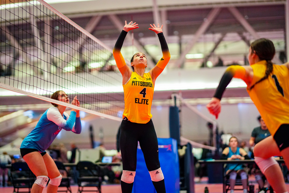 Camdynn with her hands up in preparation to set the ball to her teammate